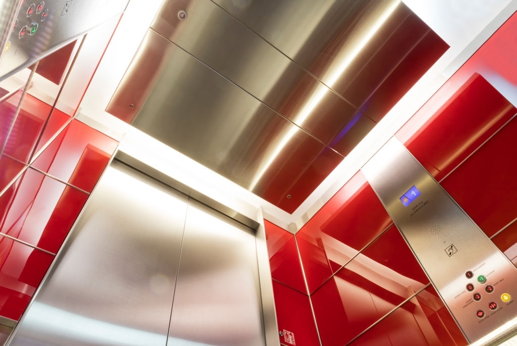 Interior of modern elevator, public building, London, England.